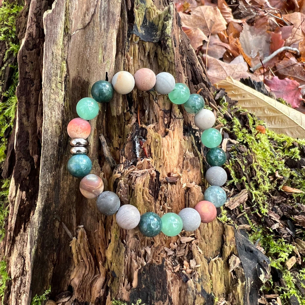 Earth Harmony Bracelet Our Earth Harmony Bracelet fuses the energies of Polychrome Jasper, Moss Agate, and Green Aventurine, which brings the wearer a sense of emotional balance, inner growth, and grounding energy.