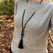 Load image into Gallery viewer, Light in the Darkness Mala Necklace Embrace your serene power within the Light in the Darkness Mala necklace. A handcrafted piece that harmonizes the ancient wisdom of gemstones with contemporary mindfulness. As you wear this hand-knotted treasure, you&#39;ll
