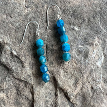 Load image into Gallery viewer, Apatite Prism Earrings These earrings are made with high-quality Apatite stones which bring clarity to the wearer. Zodiac: GeminiApatite clears away confusion and negativity and stimulates your intellect to expand your knowledge and sense of truth. It is
