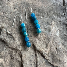 Load image into Gallery viewer, Apatite Prism Earrings These earrings are made with high-quality Apatite stones which bring clarity to the wearer. Zodiac: GeminiApatite clears away confusion and negativity and stimulates your intellect to expand your knowledge and sense of truth. It is
