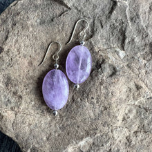 Load image into Gallery viewer, Lavender Amethyst Earrings These earrings are made with high-quality Amethyst stones which bring serenity to the wearer. Amethyst is a stone of serenity. This stone helps to calm the mind. It was once known as a “Gem of Fire” by ancient cultures. It has b
