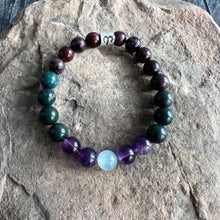 Load image into Gallery viewer, Aries Zodiac Bracelet The Aries Zodiac Bracelet is created with a combination of Aquamarine, Amethyst, Bloodstone, and Garnet beads, which resonate with the passionate, courageous qualities associated with this zodiac sign.
