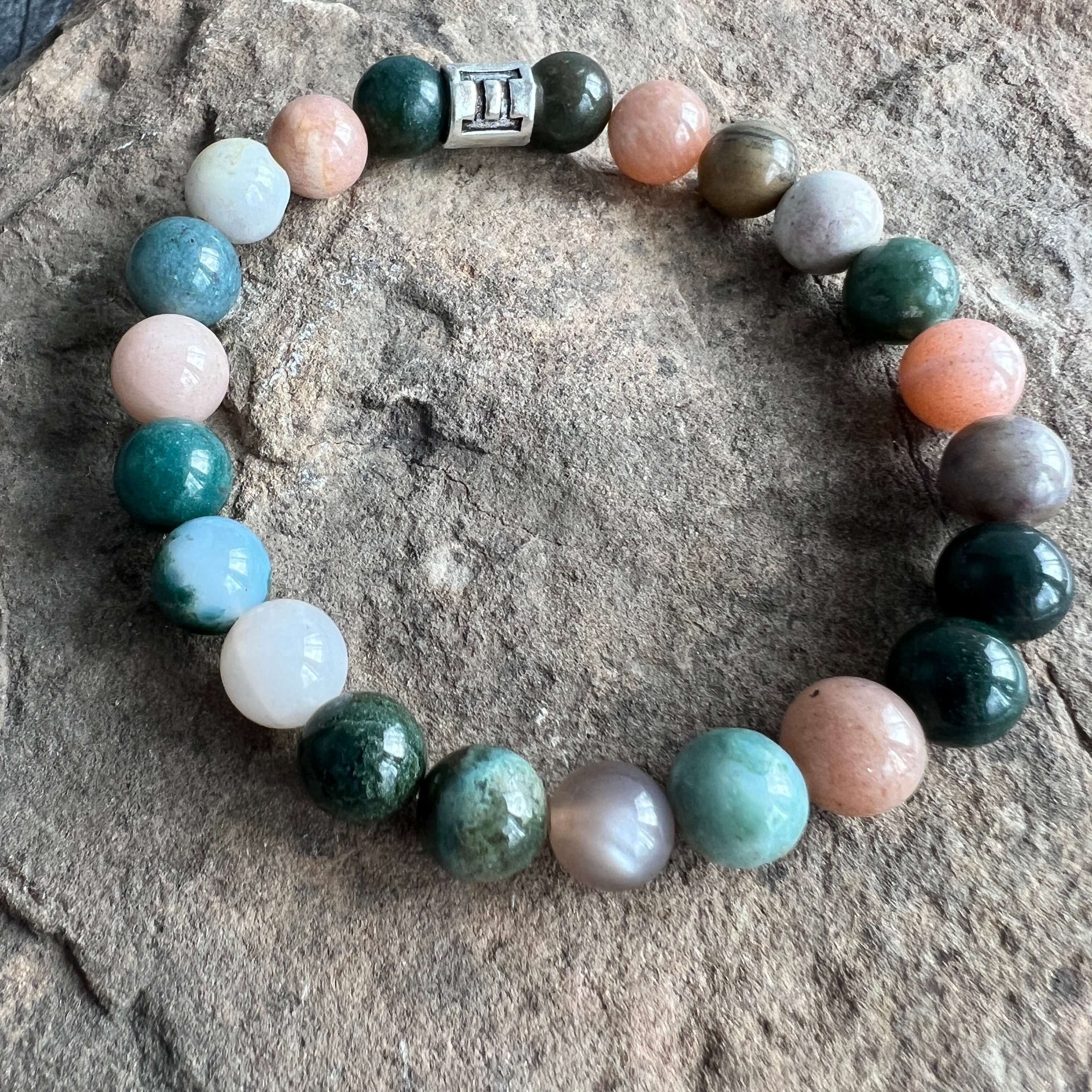 Gemini Zodiac Bracelet The Gemini Zodiac Bracelet is created with a combination of Agate and Moonstone beads with the versatile and expressive qualities associated with this zodiac sign.