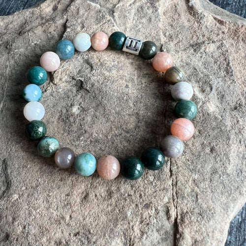 Gemini Zodiac Bracelet The Gemini Zodiac Bracelet is created with a combination of Agate and Moonstone beads with the versatile and expressive qualities associated with this zodiac sign.