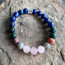 Load image into Gallery viewer, Libra Zodiac Bracelet The Libra Zodiac Bracelet is created with a combination of Rose Quartz, Agate and Lapis beads, which resonate with the graceful and harmonious qualities associated with this zodiac sign.
