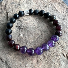 Load image into Gallery viewer, Scorpio Zodiac Bracelet The Scorpio Zodiac Bracelet is created with a combination of Amethyst, Garnet, and Black Obsidian beads which resonate with the qualities associated with with the intense and transformative qualities associated with this zodiac sig
