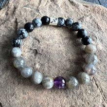 Load image into Gallery viewer, Sagittarius Zodiac Bracelet The Sagittarius Zodiac Bracelet is created with a combination of Amethyst, Labradorite, and Snowflake Obsidian beads which resonate with the the expansive and adventurous qualities of this zodiac sign.
