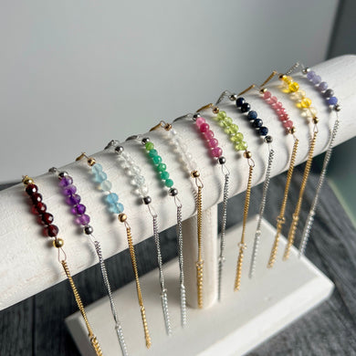 Photo displaying all birthstone bracelets.