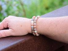 Load image into Gallery viewer, Moonstone Bead Bracelet This bracelet is made with high-quality Moonstone beads which bring inner growth to the wearer. Zodiac Sign: Gemini. Chakras: Sacral, Third Eye, and Crown. Handmade with authentic crystals &amp; gemstones in Minneapolis, MN.
