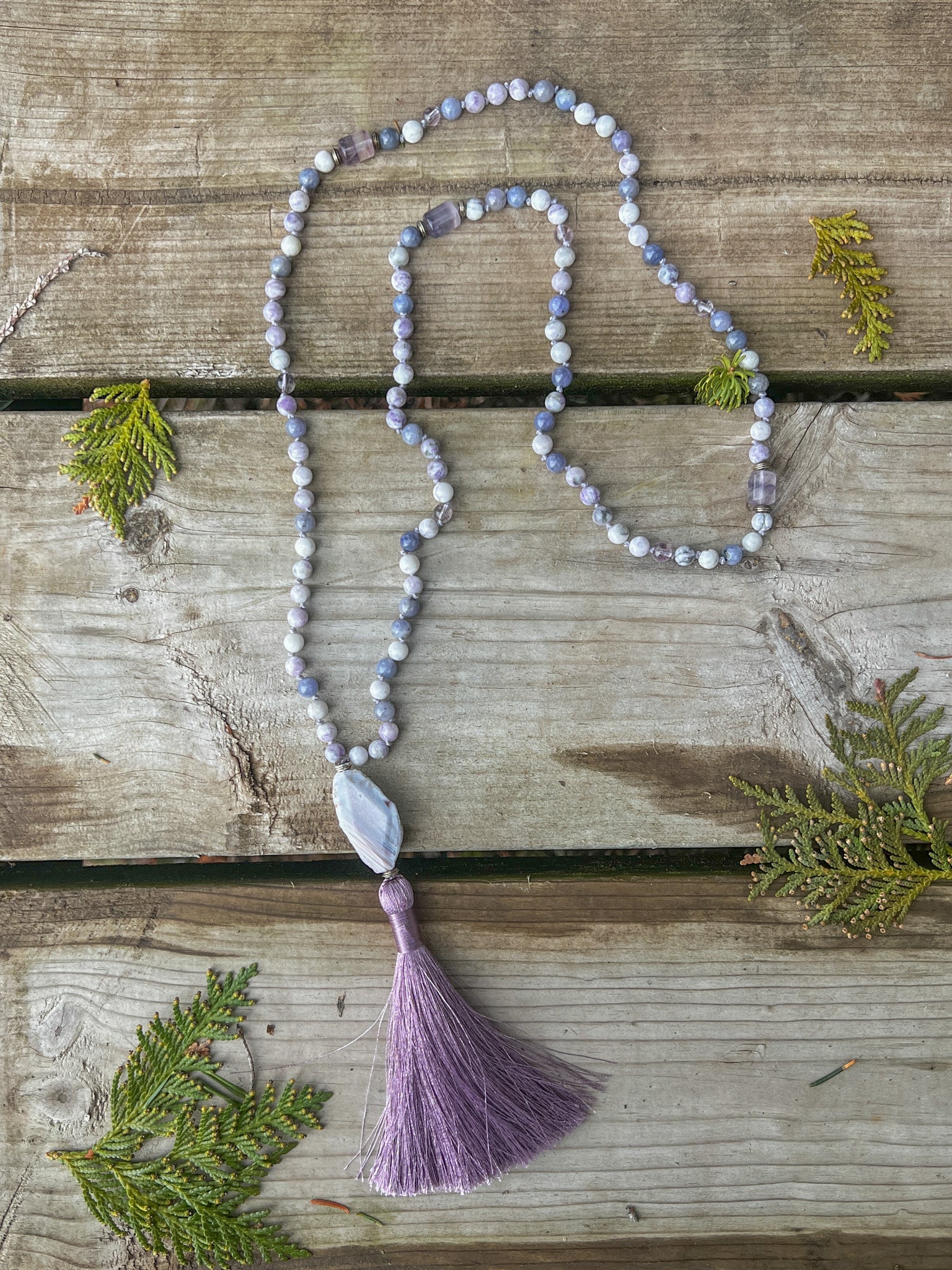 Morning Light Mala Necklace handcrafted with Tiffany Jasper, Tanzanite, Lavender Amethyst, Fluorite, and Botswana Agate.