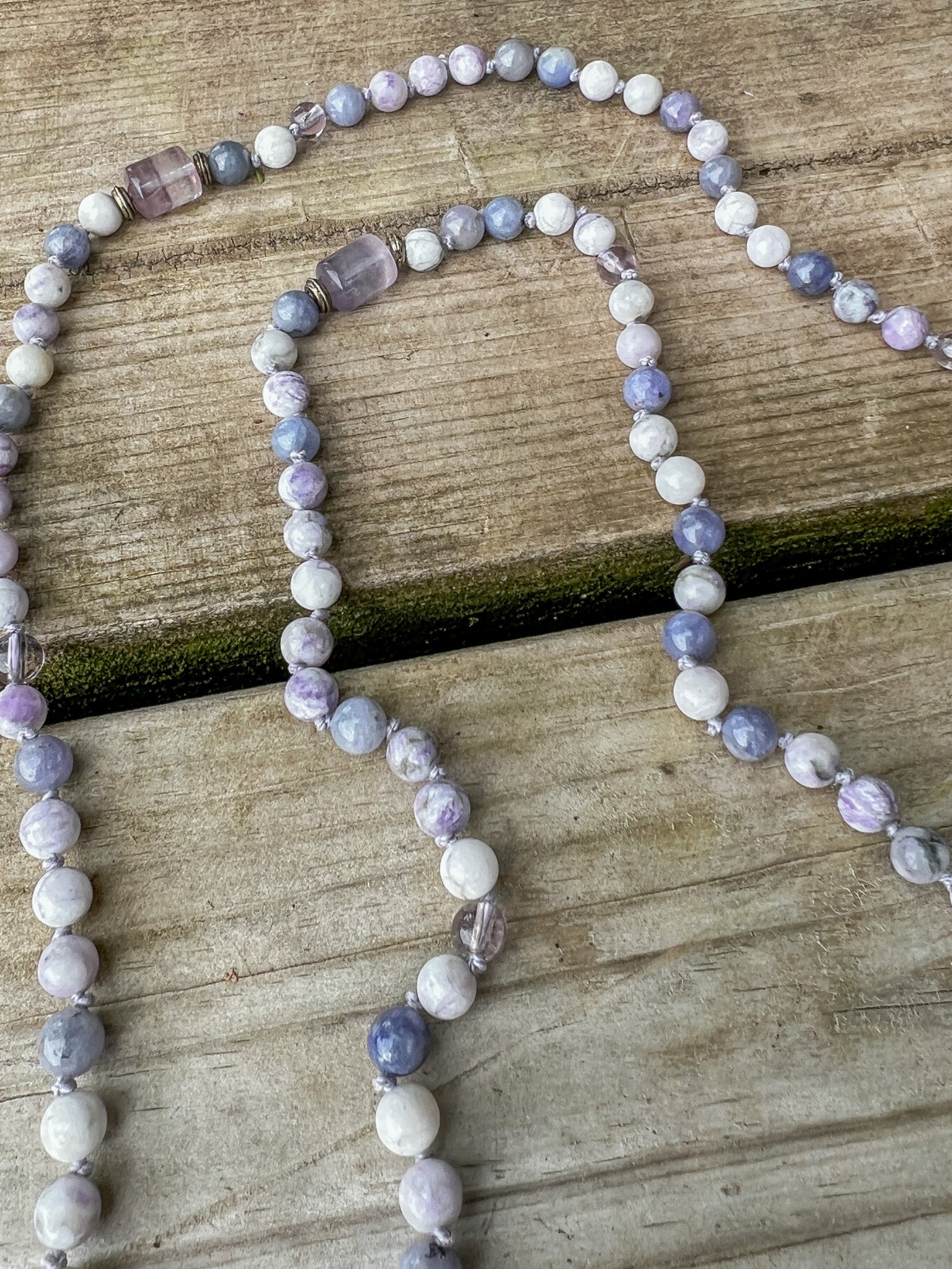 Hand-knotted Morning Light Mala featuring Tiffany Jasper, Tanzanite, Lavender Amethyst, and Fluorite marker stones.