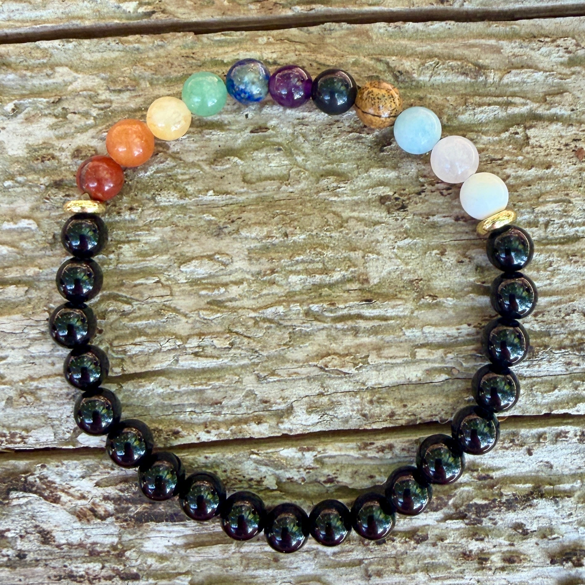 Multicolored beaded bracelet on a wooden surface