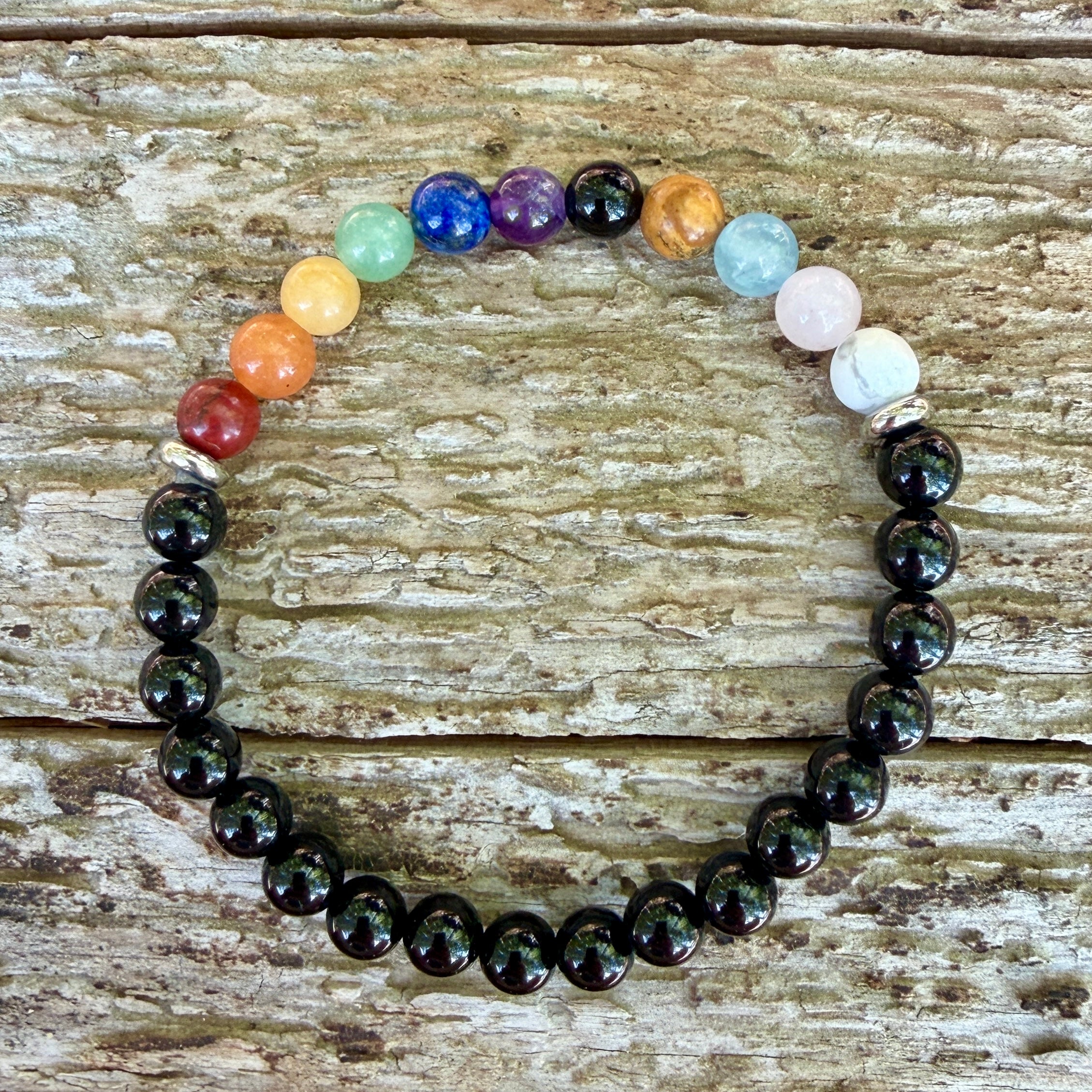 Multicolored beaded bracelet on a wooden surface