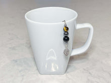 Load image into Gallery viewer, Triple Protection Tea Strainer This tea strainer is made with a stainless steel tea ball and gold sheen obsidian, hematite, and tiger eye. These stones offer protection against negative energy of all kinds- inner, spiritual, and environmental.
