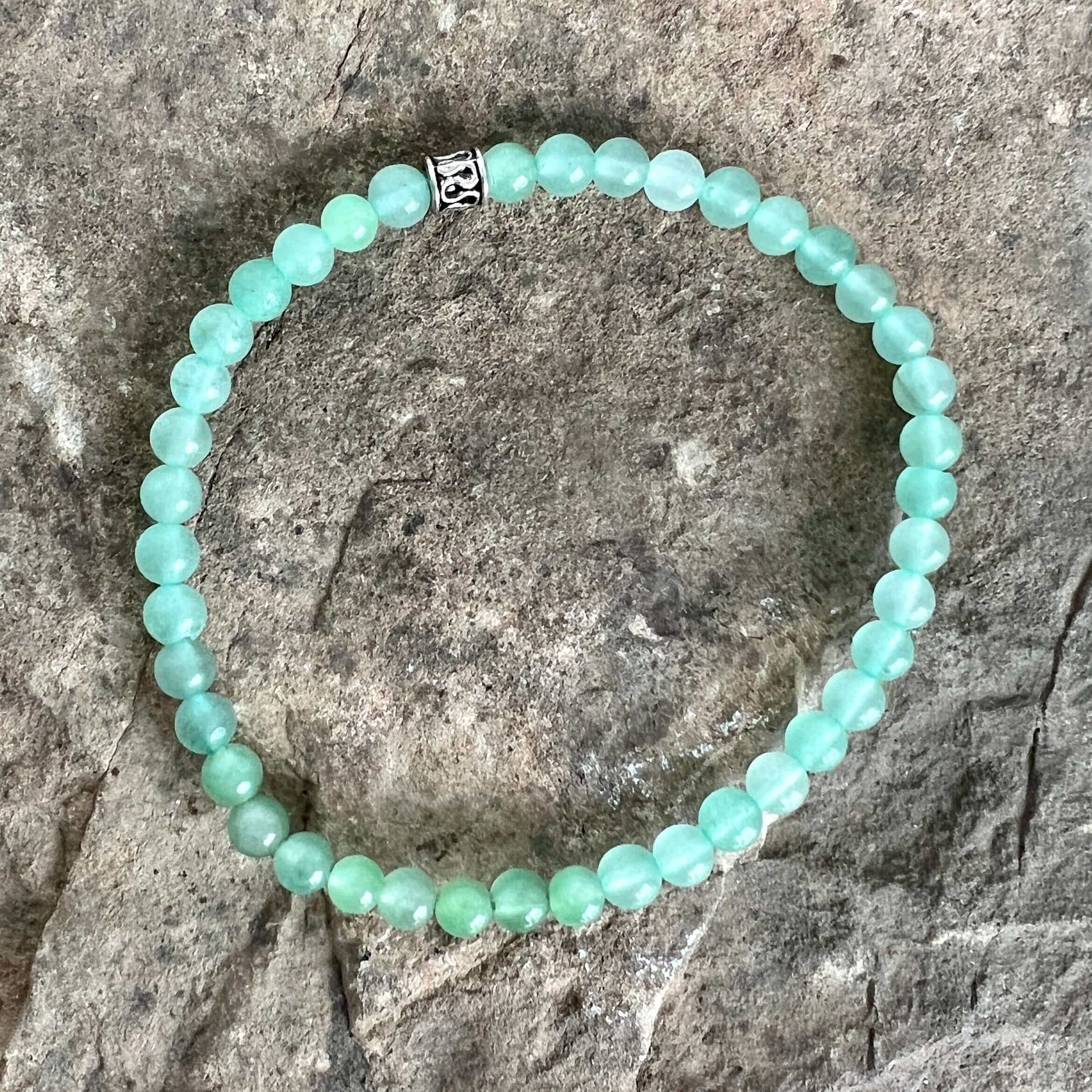 Green Aventurine Bead Bracelet This bracelet is made with high-quality Green Aventurine stones which bring comfort and protection to the wearer. Zodiac Signs: Virgo and Taurus. Chakra: Heart. Handmade with authentic crystals and gemstones in Minneapolis,