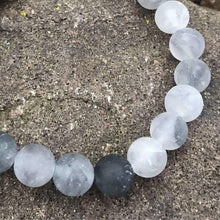Load image into Gallery viewer, Cloud Quartz Bead Bracelet This bracelet is made with high-quality Cloud Quartz stones which bring grounding energy to the wearer. Zodiac Sign: Aquarius. Chakra: Root. Handmade with authentic crystals and gemstones in Minneapolis, MN.
