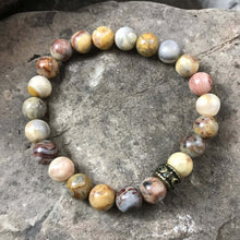 Load image into Gallery viewer, Crazy Lace Agate Bead Bracelet This bracelet is made with high-quality Crazy Lace Agate stones which bring optimism to the wearer. Zodiac Sign: Gemini. Chakras: Third Eye and Crown. Handmade with authentic crystals and gemstones in Minneapolis, MN.
