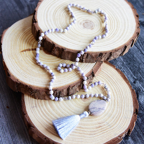 Gentle Soul Mala This mala is made with Howlite, Tiffany Jasper, Clear Quartz, and Porcelain Jasper stones which provide calm and grounding feelings for the wearer. Zodiac Signs: All. Chakras: All. Handmade with authentic crystals and gemstones in Minneap
