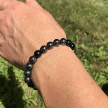 Load image into Gallery viewer, Hematite and Black Obsidian Bead Bracelet This bracelet is made with high-quality Hematite and Black Obsidian stones which bring balance and self-awareness to the wearer. Zodiac Signs: Aquarius, Aries, and Scorpio. Chakras: Root. Handmade with authentic c
