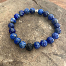 Load image into Gallery viewer, Lapis Lazuli Bead Bracelet This bracelet is made with high-quality Lapis Lazuli stones which bring wisdom to the wearer. Zodiac: Sagittarius and Libra. Chakras: Third Eye, Crown, and Throat. Handmade with authentic crystals &amp; gemstones in Minneapolis, MN.
