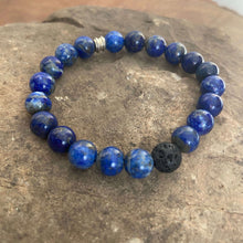 Load image into Gallery viewer, Lapis Lazuli Bead Bracelet This bracelet is made with high-quality Lapis Lazuli stones which bring wisdom to the wearer. Zodiac: Sagittarius and Libra. Chakras: Third Eye, Crown, and Throat. Handmade with authentic crystals &amp; gemstones in Minneapolis, MN.
