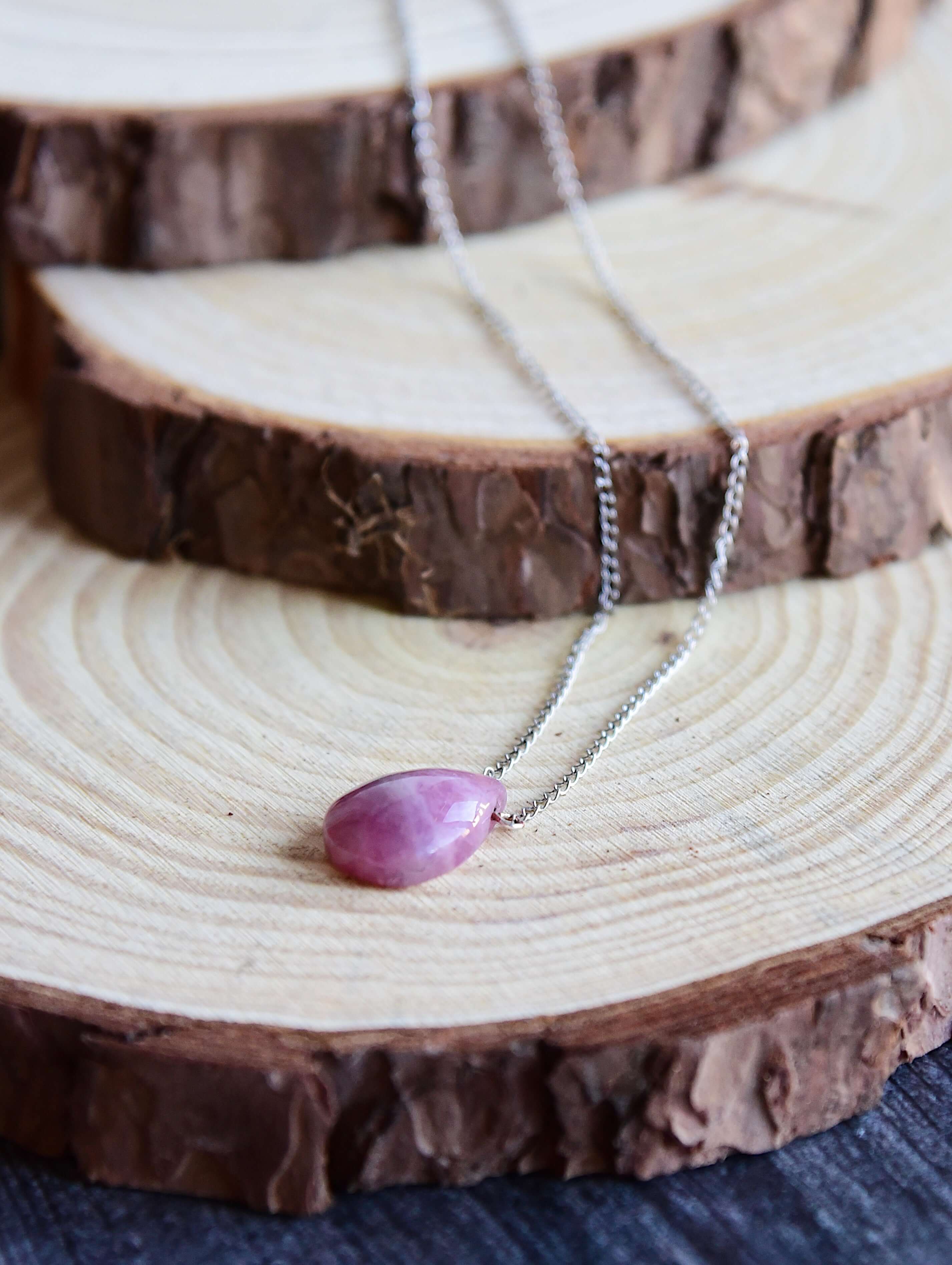 Madagascar Rose Quartz Pendant Necklace This necklace is made with an authentic Madagascar Rose Quartz stone, which serves to inspire and enhance feelings of unconditional love. Zodiac Signs: Aquarius, Pisces, Aries, and Taurus. Chakras: Heart. Handmade w