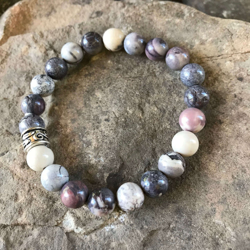 Porcelain Jasper Bracelet This bracelet is made with high-quality Porcelain Jasper gemstones which are used as a powerful tool to calm and soothe the person holding it. It is also said to enhance creativity, confidence, and self-esteem. Zodiac Sign: Virgo