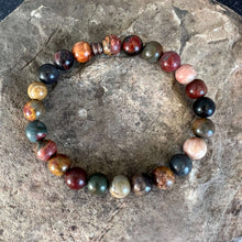 Load image into Gallery viewer, Red Creek Jasper Bracelet This bracelet is made with high-quality Red Creek Jasper gemstones which bring grounding energy to the wearer. Zodiac Signs: Aries and Scorpio. Chakras: Root and Sacral. Handmade with authentic crystals &amp; gemstones in Minneapolis
