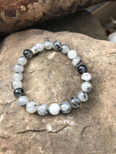 Load image into Gallery viewer, Tourmaline Quartz Bracelet This bracelet is made with high-quality Tourmaline Quartz gemstones which bring balance and luck to the wearer. Zodiac Signs: Libra, Scorpio Chakra: Root. Handmade with authentic crystals &amp; gemstones in Minneapolis, MN.

