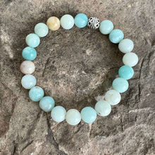 Load image into Gallery viewer, Black Gold Amazonite Bracelet This bracelet is made with high-quality Black Gold Amazonite stones which bring inspiration and calm to the wearer. Zodiac Sign: Virgo. Chakras: Heart and Throat. Handmade with authentic crystals and gemstones in Minneapolis,
