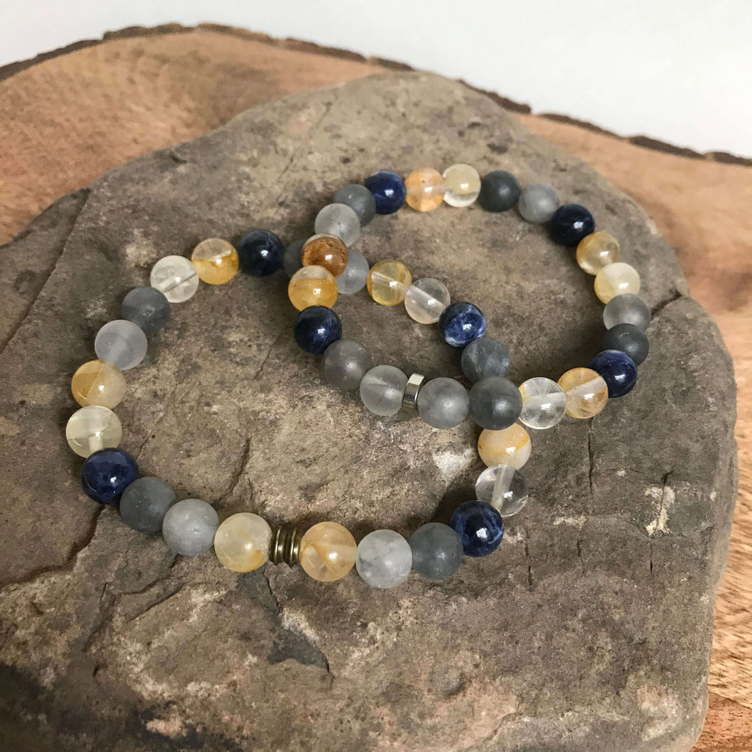 Oregon Coast Bead Bracelet This bracelet is made with high-quality Sodalite, Cloudy Quartz, and Yellow Jade gemstones which bring self-confidence, focus, and creativity to the wearer. Zodiac Signs: Sagittarius, Aries & Pisces. Chakras: Throat, Third Eye,