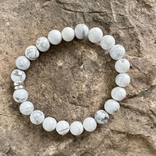 Load image into Gallery viewer, Howlite Bead Bracelet This bracelet is made with high-quality Howlite stones which bring calm and patience to the wearer. Zodiac Signs: Gemini and Virgo. Chakras: All. Handmade with authentic crystals &amp; gemstones in Minneapolis, MN
