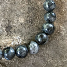 Load image into Gallery viewer, Larvikite Bracelet This bracelet is made with high-quality Larvikite stones which bring protection and a strong connection to nature to the wearer. Zodiac Signs: Aquarius. Chakras: Root and Third Eye. Handmade with authentic crystals &amp; gemstones in Minnea
