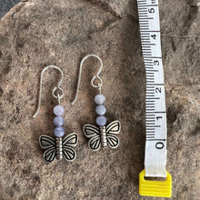 Load image into Gallery viewer, Devon&#39;s Butterfly Earrings These earrings are made with genuine Tanzanite stones with a pewter Butterfly. All profits from the sale of these earrings will be donated to the Pediatric Heart Program at Children&#39;s Hospital MN in memory of Devon Jenson, the h
