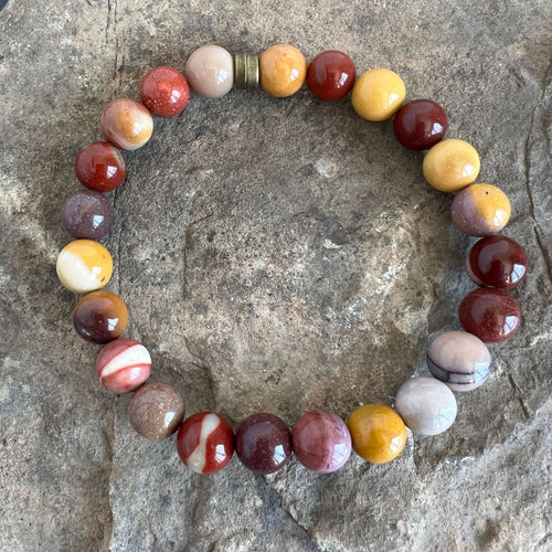 Mookaite Jasper Bracelet This bracelet is made with high-quality Mookaite gemstones which bring stability to the wearer. Zodiac Signs: Virgo and Scorpio. Chakras: Root, Sacral, and Solar Plexus. Handmade with authentic crystals & gemstones in Minneapolis,