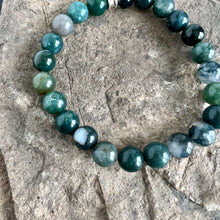 Load image into Gallery viewer, Moss Agate Bracelet This bracelet is made with high-quality Moss Agate gemstones which bring abundance and grounding energy to the wearer. Zodiac Sign: Virgo. Chakra: Heart. Handmade with authentic crystals &amp; gemstones in Minneapolis, MN.
