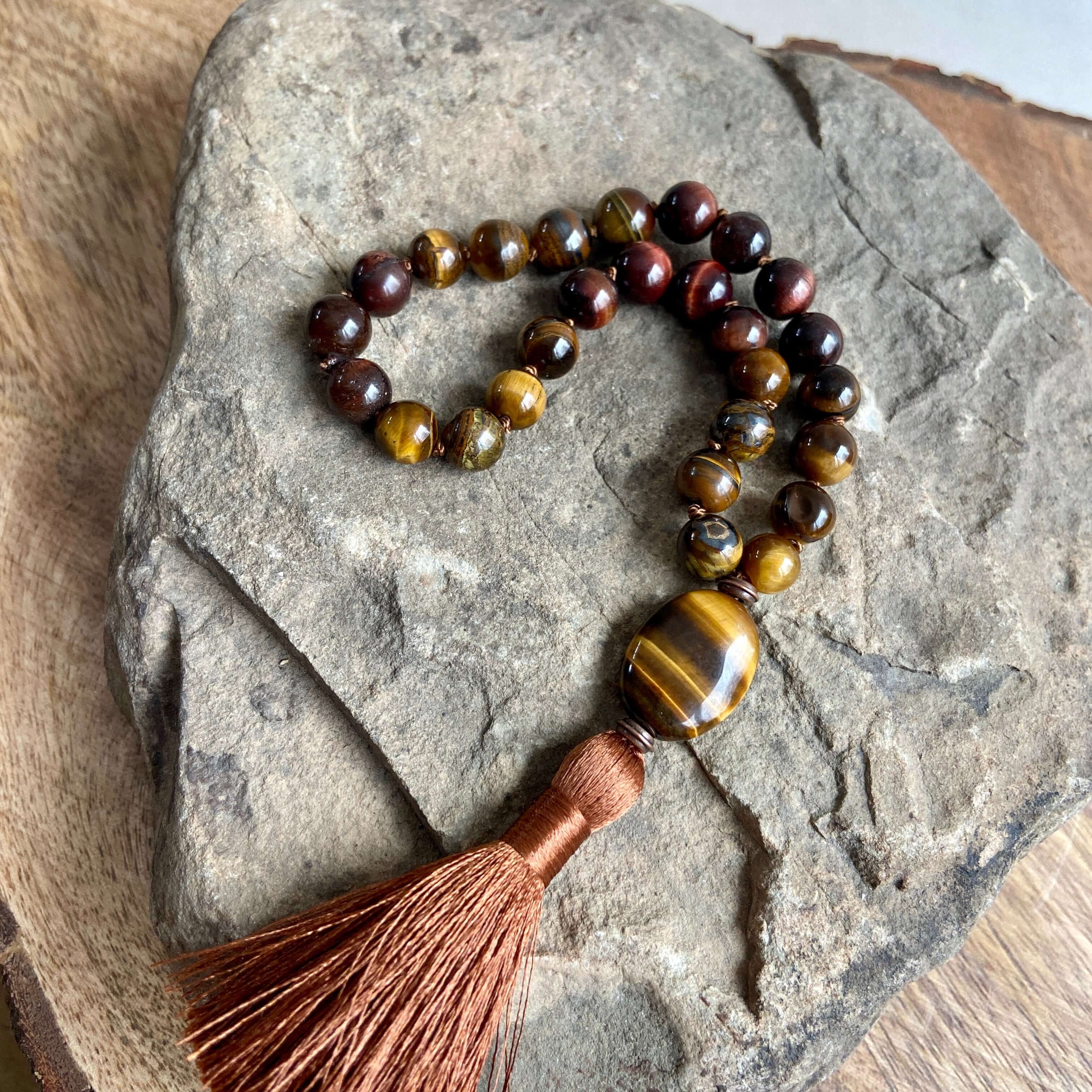 Tiger Eye Quarter Mala A mala is used as a meditation tool. In japa meditation, a mantra is repeated 108 times. A mala necklace has 108 stones. A quarter mala has 27 stones which means you can make 4 turns around the mala to complete your meditation. They