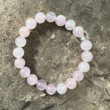 Load image into Gallery viewer, Rose Quartz Bead Bracelet This bracelet is made with high-quality Rose Quartz gemstones which bring love and purification to the wearer. Zodiac Sign: Taurus. Chakra: Heart. Handmade with authentic crystals &amp; gemstones in Minneapolis, MN.
