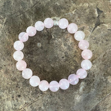 Load image into Gallery viewer, Rose Quartz Bead Bracelet This bracelet is made with high-quality Rose Quartz gemstones which bring love and purification to the wearer. Zodiac Sign: Taurus. Chakra: Heart. Handmade with authentic crystals &amp; gemstones in Minneapolis, MN.
