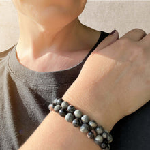 Load image into Gallery viewer, Silver Leaf Jasper Bracelet This bracelet is made with high-quality Silver Leaf Jasper stones which bring grounding energy and balance to the wearer. Zodiac: Leo &amp; Libra. Chakras: All. Handmade with authentic crystals and gemstones in Minneapolis, MN.
