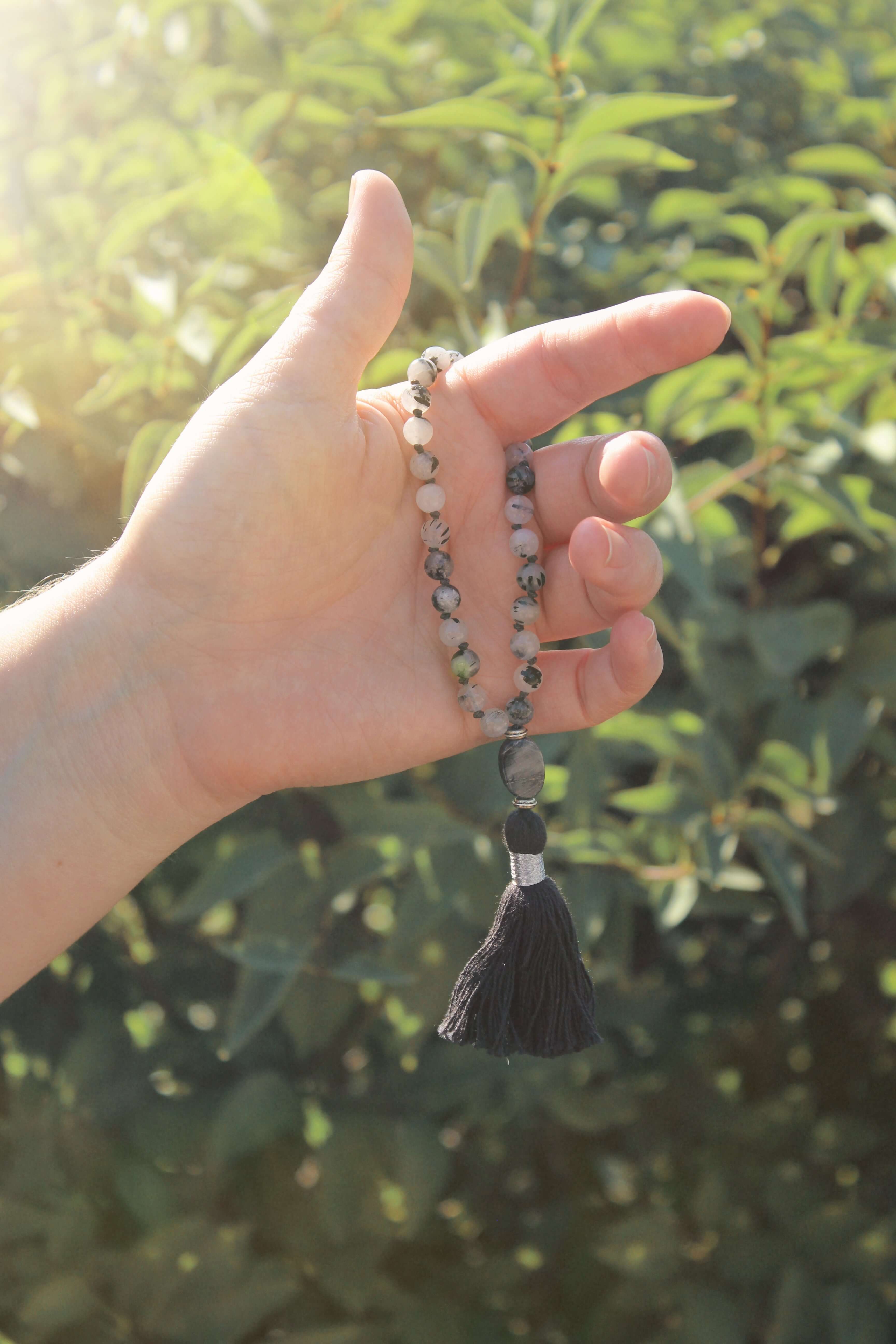 Tourmaline Quartz Wrist Mala These quarter malas are made with high-quality Tourmaline Quartz and Jasper gemstones which bring protection and tranquility to the wearer. Jasper is known as the “supreme nurturer.” Zodiac Signs: Libra, Scorpio, and Leo. Chak